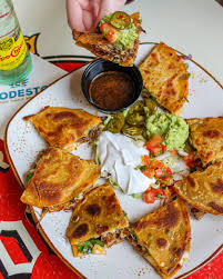 Modesto Tacos Tequila Whiskey signature dishes BirriaQuesadillasCarne Asada